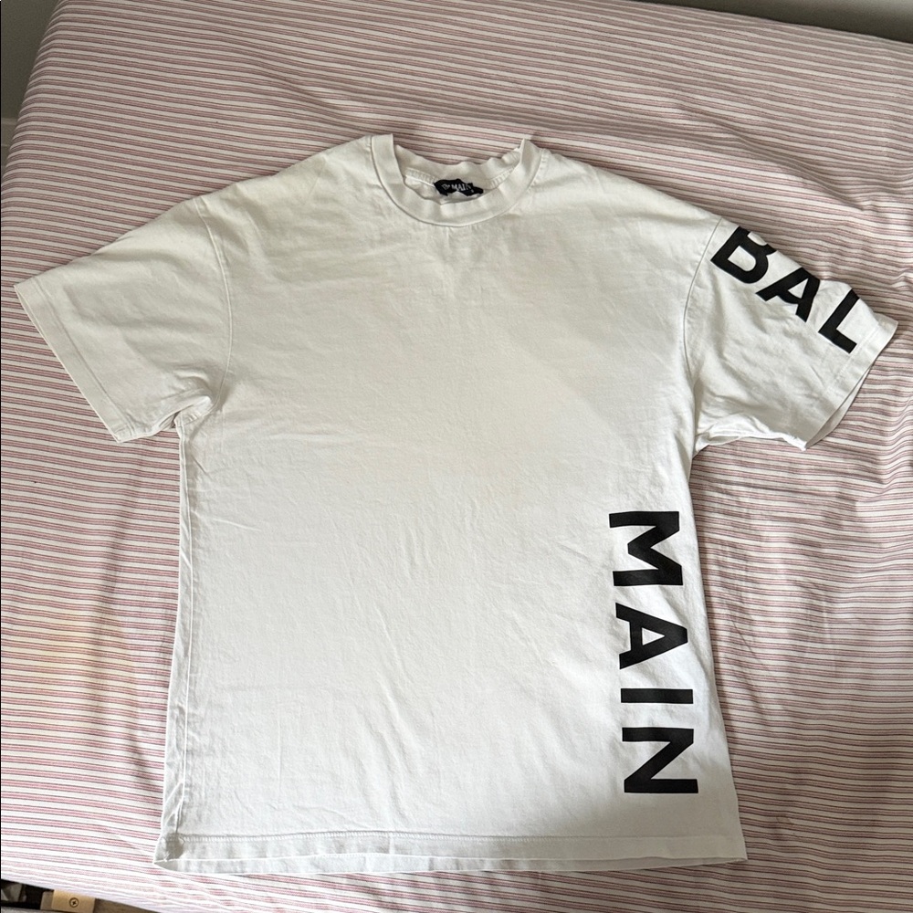 Balmain White Tee with Bold Black Lettering